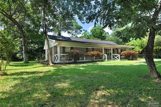 exterior space featuring a lawn