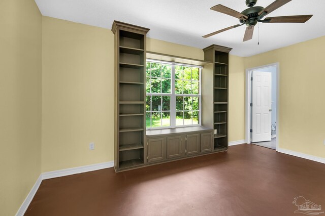 unfurnished bedroom featuring ceiling fan