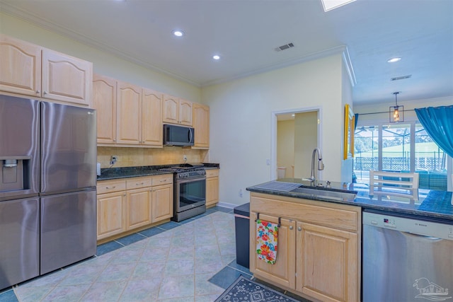 kitchen featuring light brown cabinets, stainless steel appliances, crown molding, and light tile patterned floors