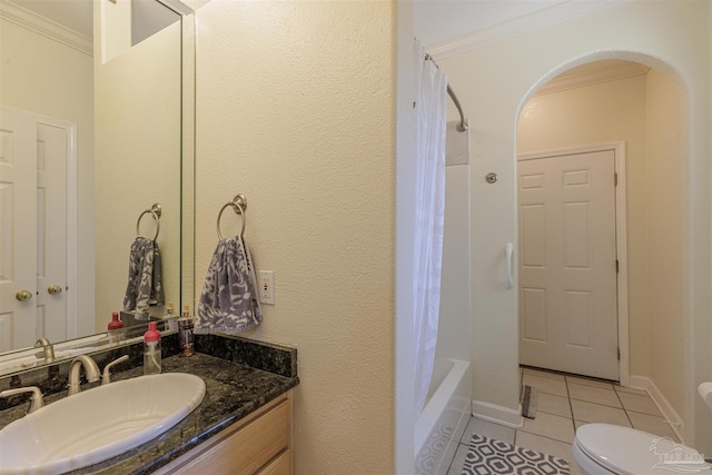 full bathroom featuring vanity, tile patterned flooring, ornamental molding, shower / tub combo, and toilet