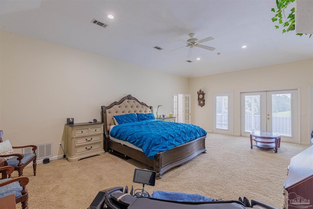 carpeted bedroom with access to exterior, ceiling fan, and french doors