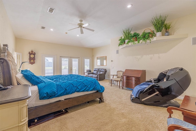 carpeted bedroom featuring french doors, access to exterior, and ceiling fan