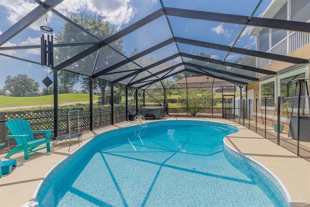 view of pool featuring a patio and a lanai