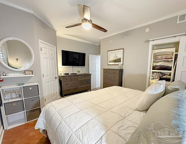 bedroom featuring tile patterned floors, visible vents, ceiling fan, and crown molding