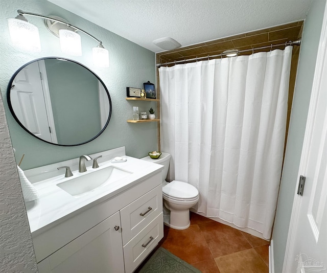 bathroom featuring vanity, a shower with shower curtain, a textured ceiling, toilet, and a textured wall