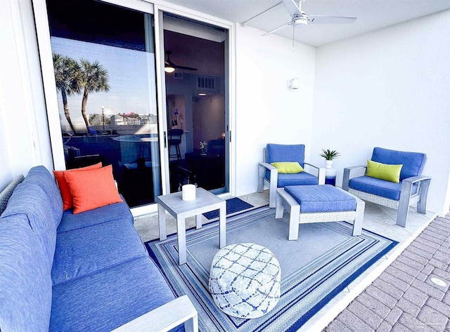 view of patio featuring a ceiling fan and visible vents