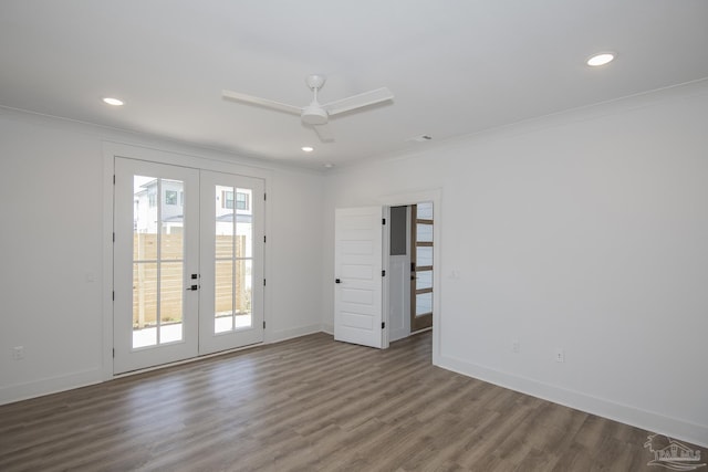 unfurnished room with wood-type flooring, ornamental molding, french doors, and ceiling fan