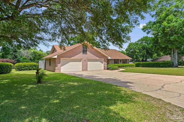 5816 Forest Ridge Dr, Pensacola, FL 32526 - view of front of house with driveway, a front yard, brick siding, and an attached garage