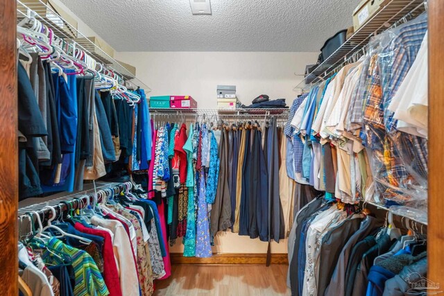 5816 Forest Ridge Dr, Pensacola, FL 32526 - walk in closet with wood finished floors