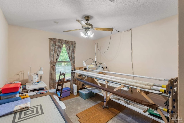 5816 Forest Ridge Dr, Pensacola, FL 32526 - home office featuring a ceiling fan, a textured ceiling, and radiator