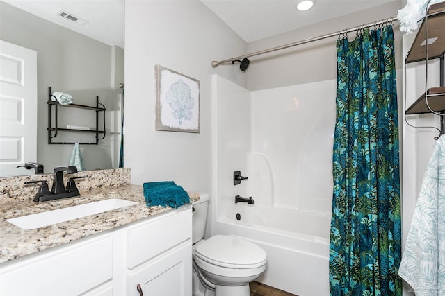 full bath with toilet, shower / tub combo, vanity, and visible vents