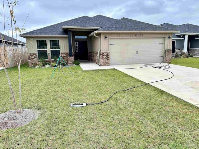 prairie-style home featuring brick siding, roof with shingles, an attached garage, and driveway