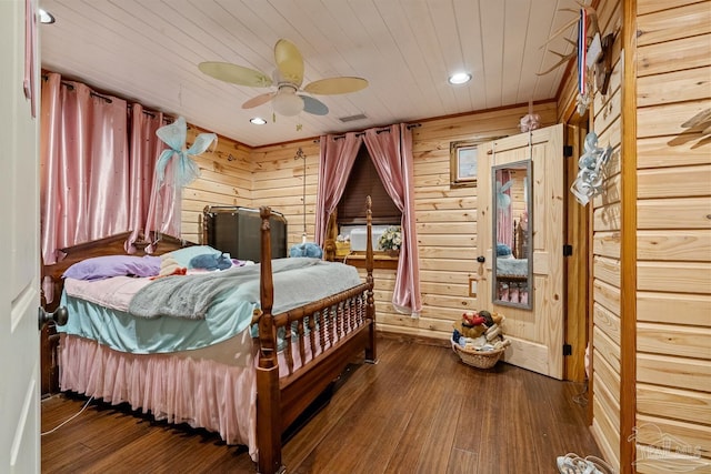 bedroom featuring recessed lighting, wood finished floors, wood ceiling, and wooden walls