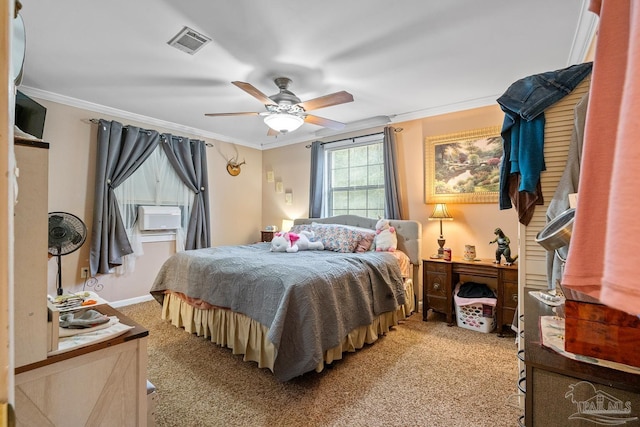 bedroom with ceiling fan, ornamental molding, visible vents, and light colored carpet