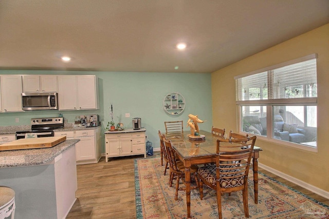 dining area featuring light hardwood / wood-style flooring