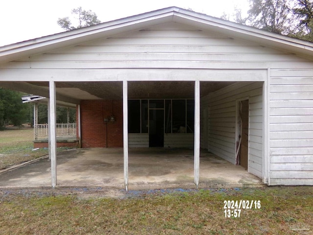 exterior space with an attached carport