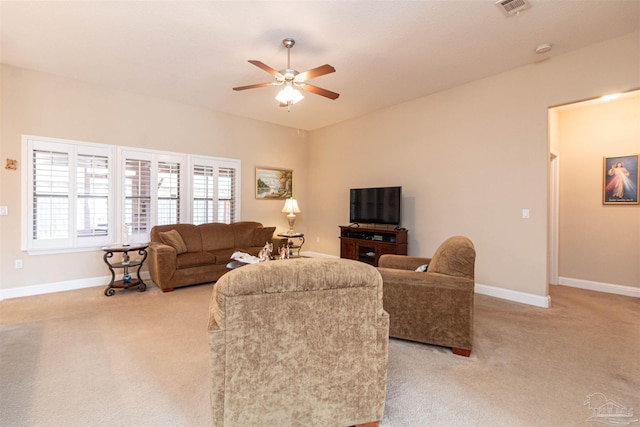2255 Reed Ridge Ct, Navarre, FL 32566 - living area featuring light colored carpet, baseboards, a ceiling fan, and visible vents