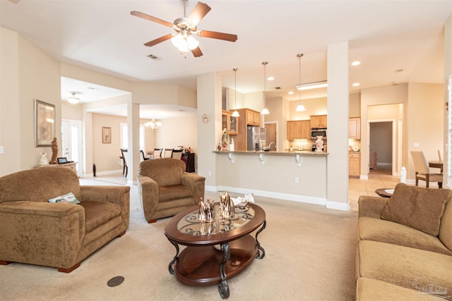 2255 Reed Ridge Ct, Navarre, FL 32566 - living room with recessed lighting, baseboards, visible vents, ceiling fan with notable chandelier, and light colored carpet