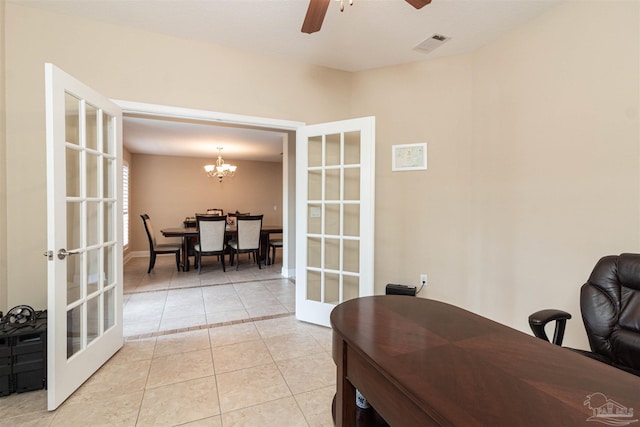 2255 Reed Ridge Ct, Navarre, FL 32566 - office area featuring light tile patterned floors, french doors, visible vents, and ceiling fan with notable chandelier