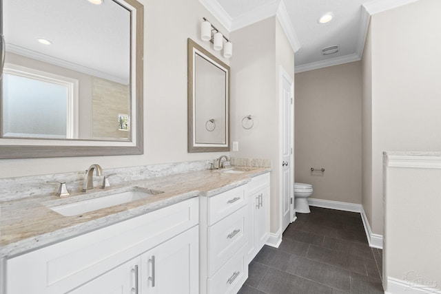 bathroom with tile patterned floors, vanity, toilet, and crown molding