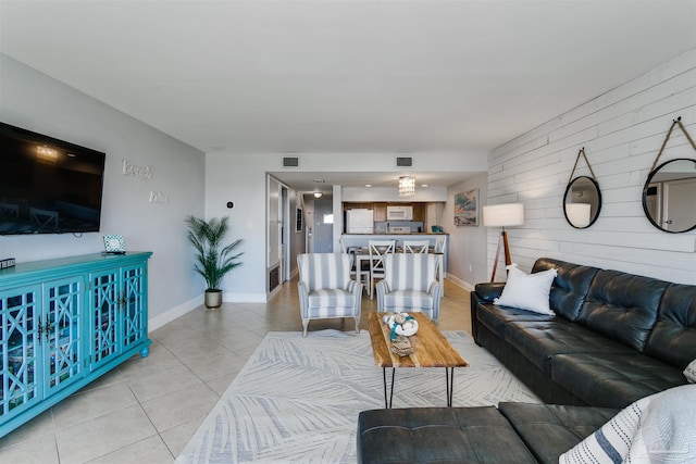 tiled living room with wood walls