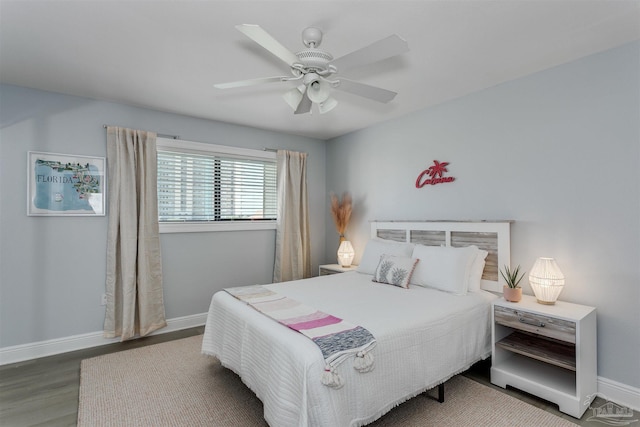 bedroom with ceiling fan and hardwood / wood-style flooring