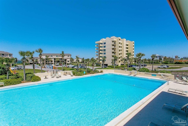 view of swimming pool with a patio area and a pergola