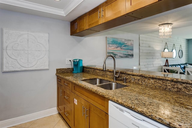 kitchen with stone counters, sink, crown molding, white dishwasher, and light tile patterned flooring