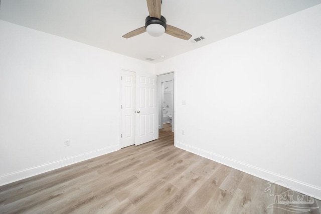 unfurnished room featuring ceiling fan and light hardwood / wood-style floors