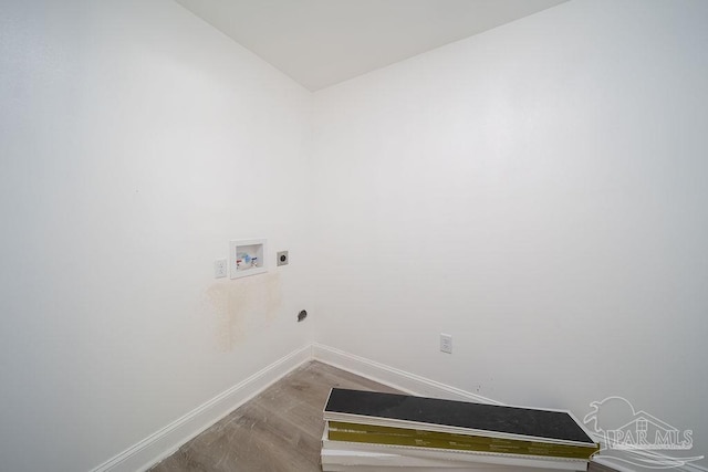 laundry area with wood-type flooring, hookup for an electric dryer, and hookup for a washing machine