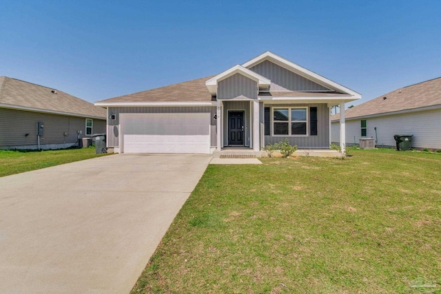 6034 Secretariat Way, Pensacola, FL 32526 - single story home featuring a front yard, central AC, a garage, board and batten siding, and concrete driveway