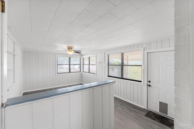 interior space featuring hardwood / wood-style floors and ceiling fan