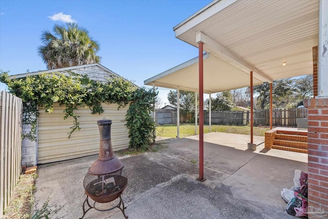 view of patio featuring an outdoor fire pit