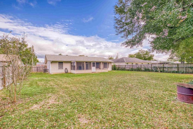 view of yard featuring a sunroom