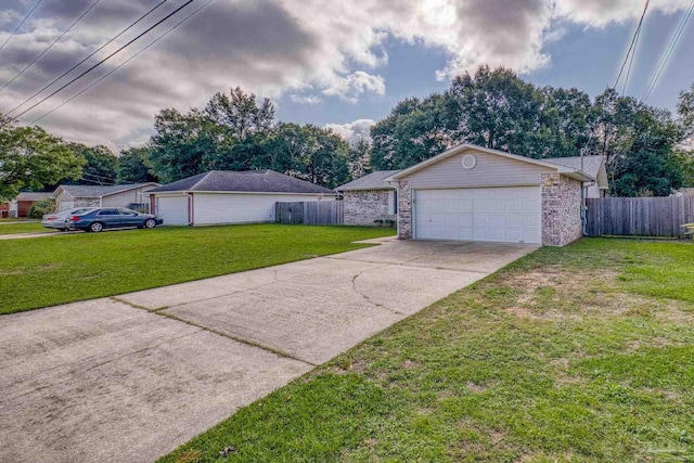 exterior space featuring a garage and a front yard