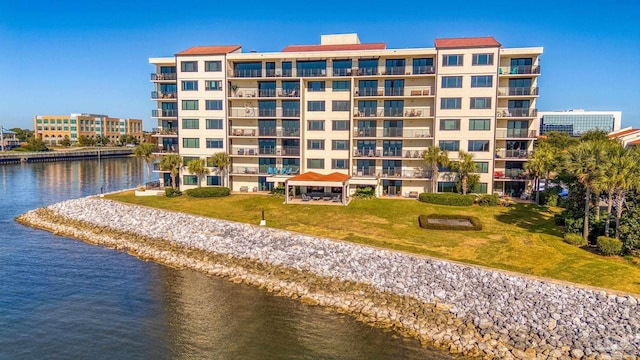 view of building exterior featuring a water view