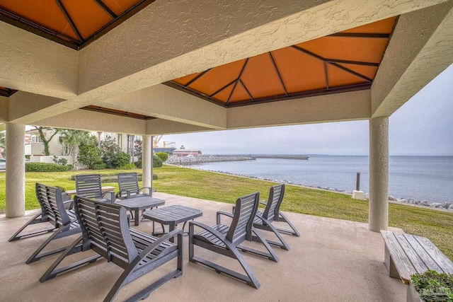 view of patio / terrace featuring a water view