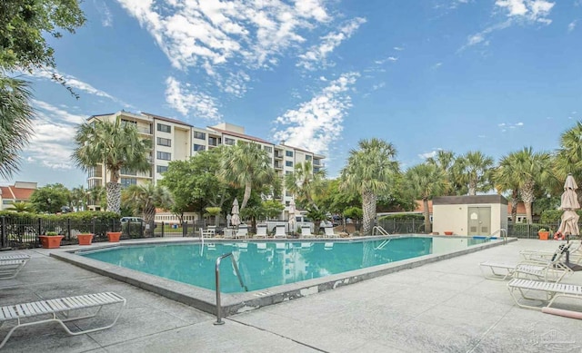 view of pool featuring a patio