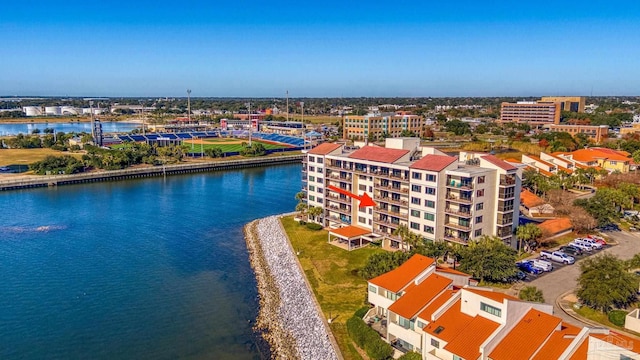 birds eye view of property with a water view