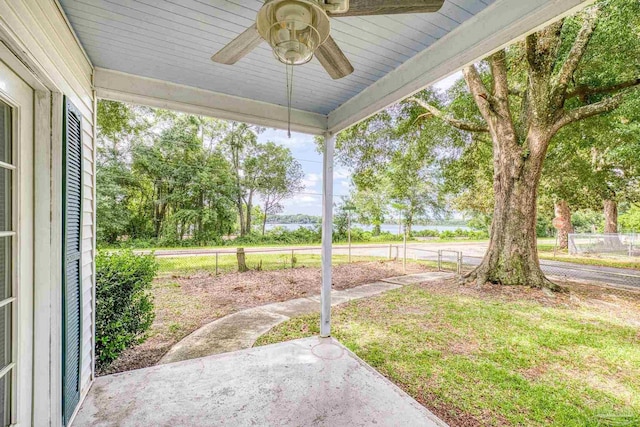 7074 Milton Ct, Milton, FL 32583 - view of yard featuring ceiling fan and a patio