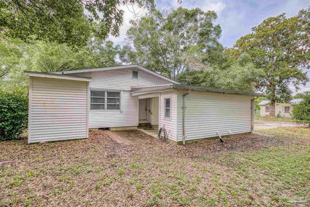7074 Milton Ct, Milton, FL 32583 - rear view of property featuring entry steps