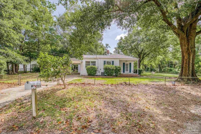 7074 Milton Ct, Milton, FL 32583 - ranch-style home with an attached carport
