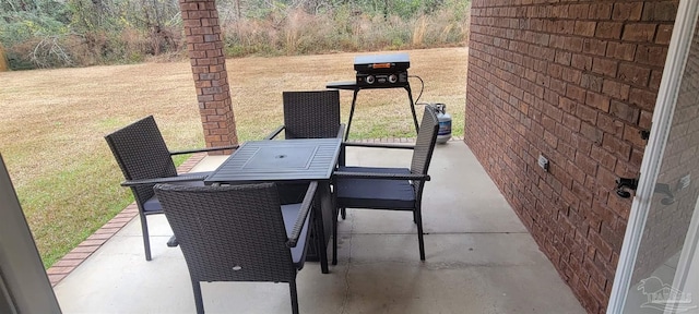 view of patio with outdoor dining area