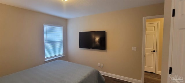 bedroom with baseboards