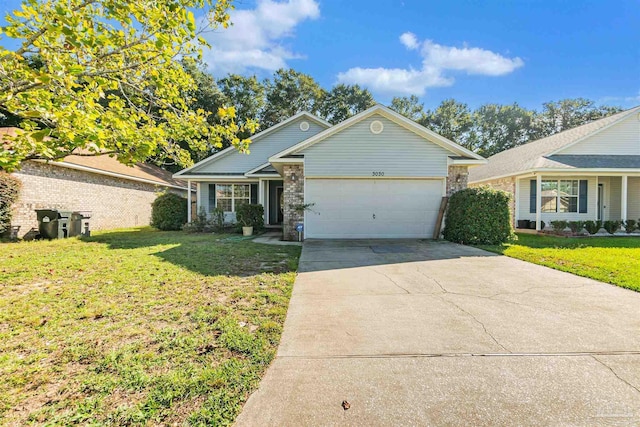 view of front of home with a front yard, a garage, and driveway