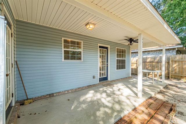 view of patio / terrace featuring a ceiling fan and fence