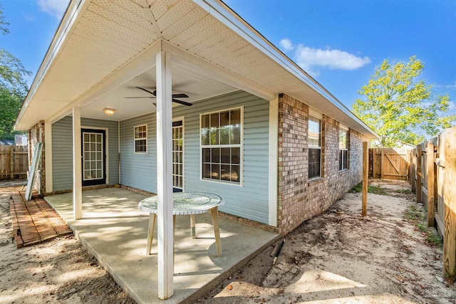 view of patio / terrace with a fenced backyard and ceiling fan