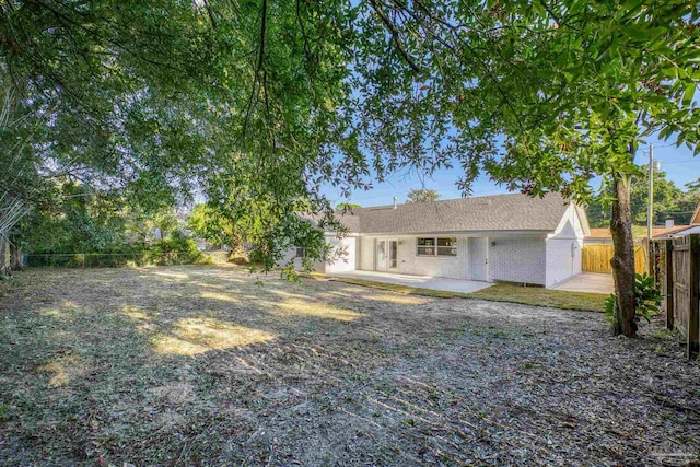 rear view of house featuring a patio area