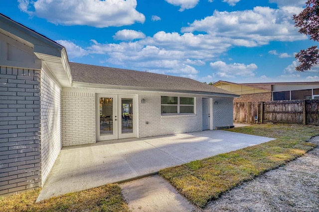 rear view of house featuring a patio