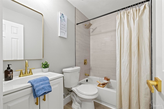 full bathroom with vanity, shower / bath combination with curtain, and toilet